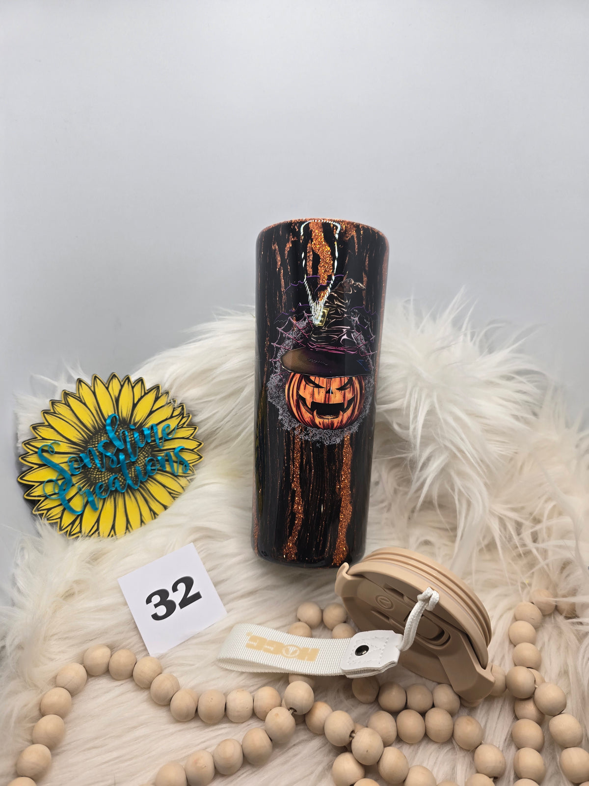 #32 - 24oz Dual Flip, tan lid - Black/Orange Crackle with Witch & Pumpkin