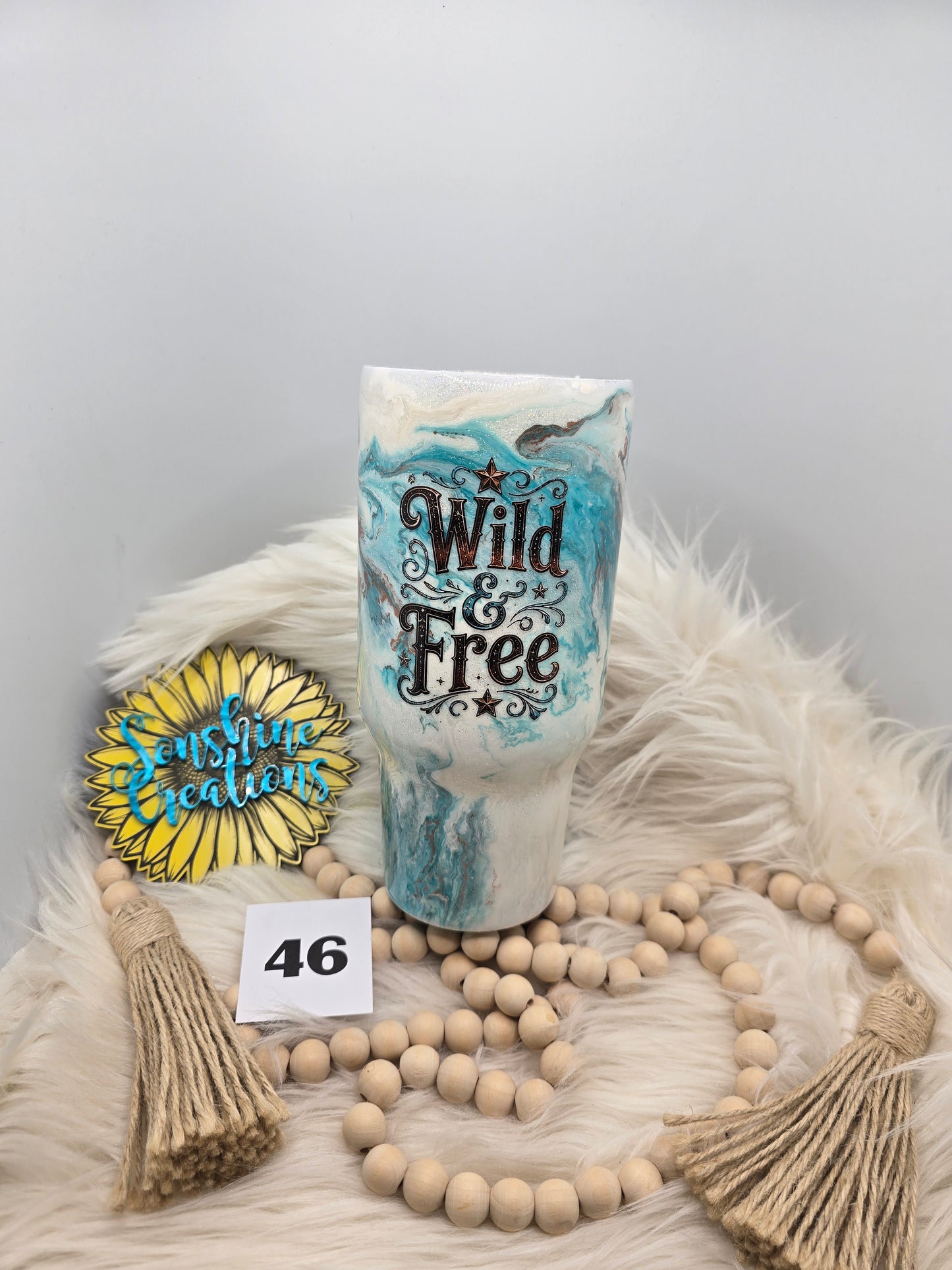 #46- 32oz Tipsy Traveler- Teal marble- Western bow "Wild and Free"