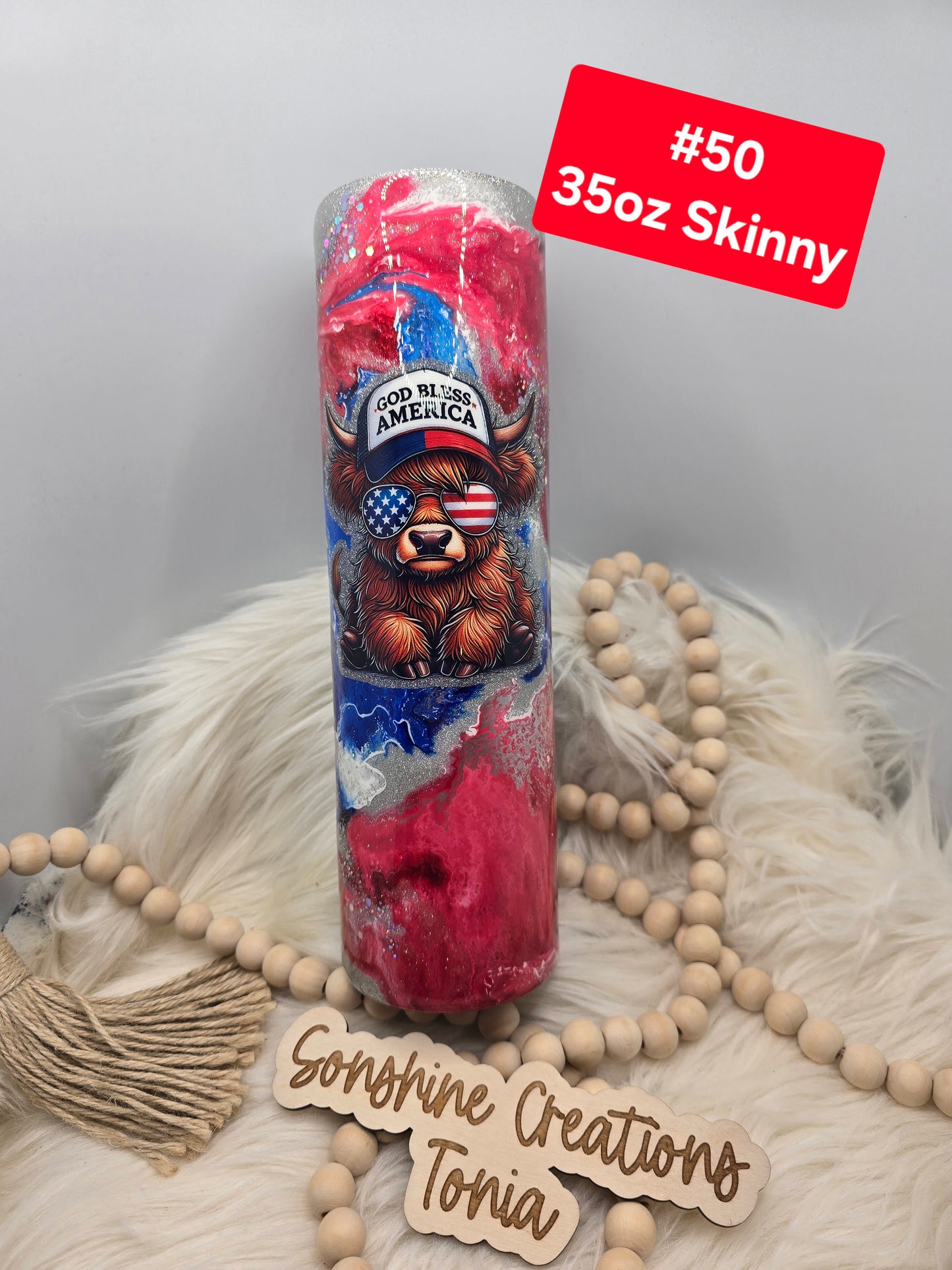 #50 Tonia's Live Creations : 35oz Skinny- Red white blue clouds- God bless America cow