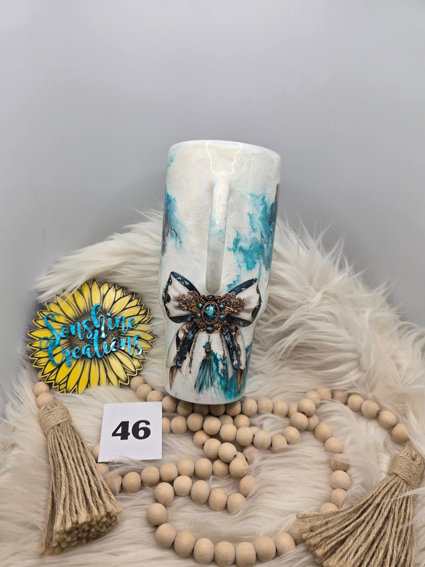 #46- 32oz Tipsy Traveler- Teal marble- Western bow "Wild and Free"